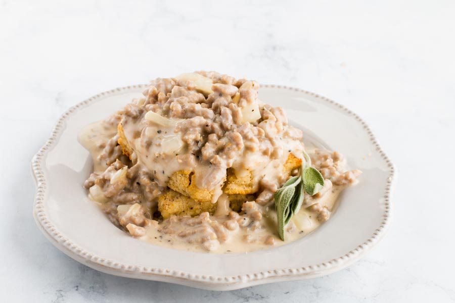 side angle view of keto biscuits and gravy