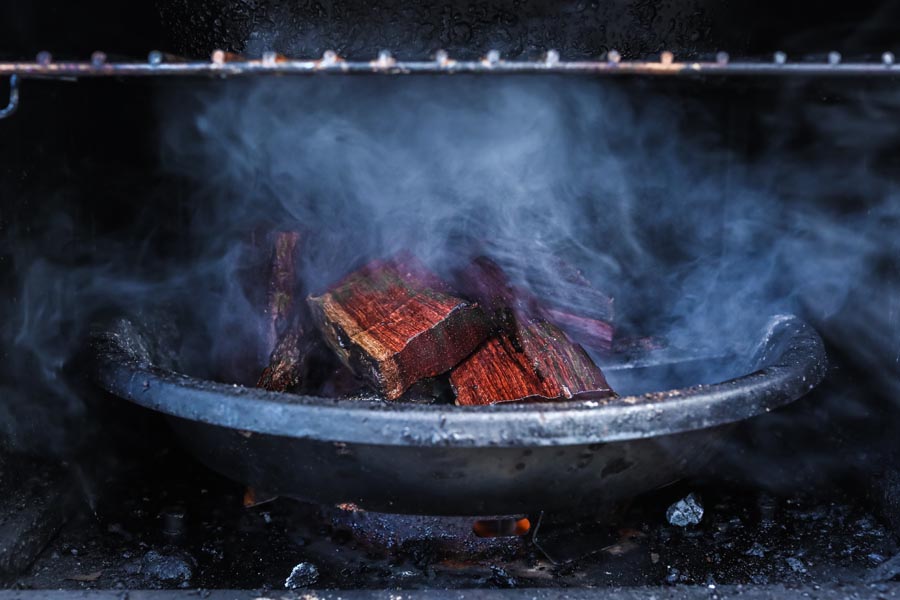 mesquite chips in a smoker bowl