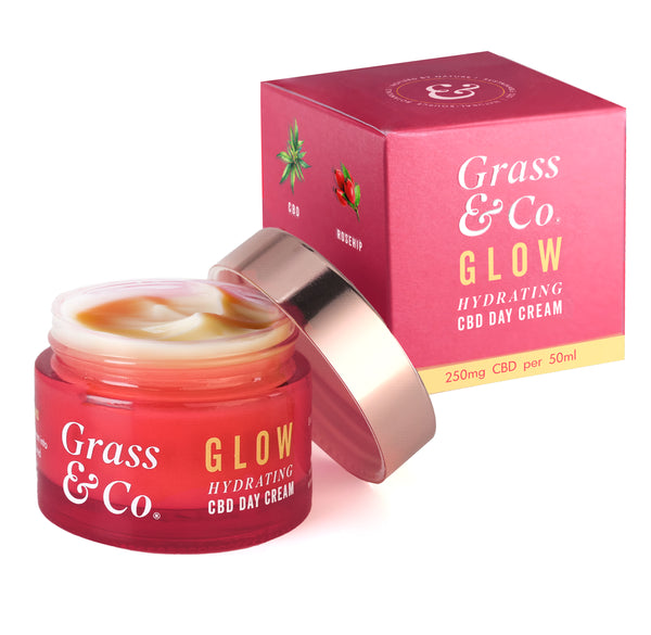 Grass & Co. CBD moisturising cream next to packaging.