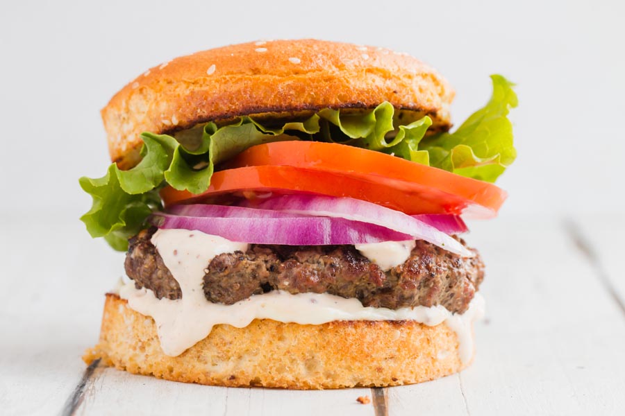 a grilled burger with lettuce