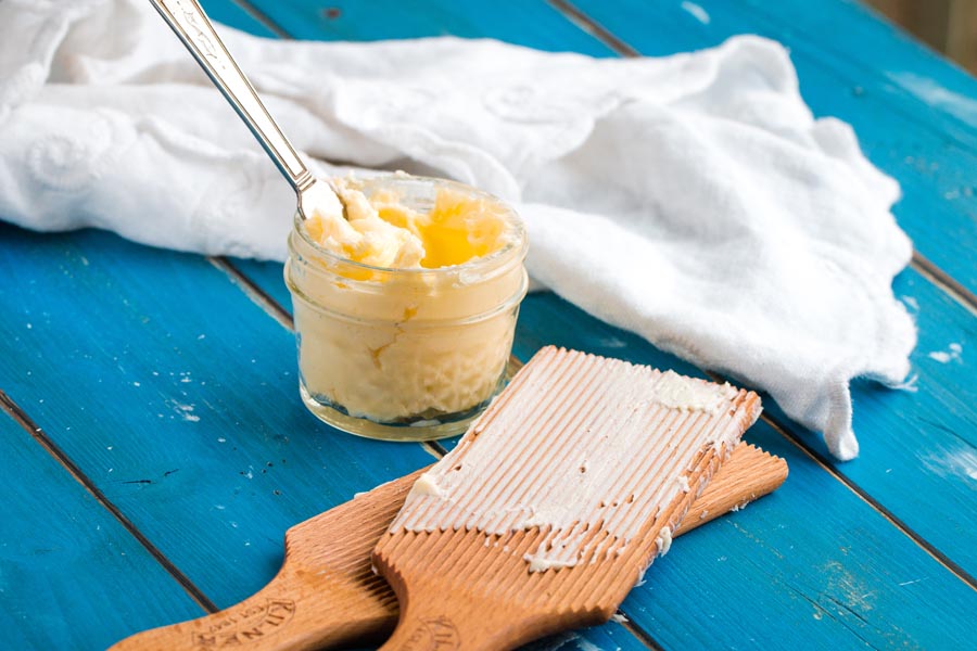 jar of butter with butter paddles