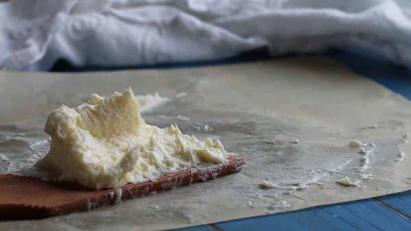 molding butter with butter paddles