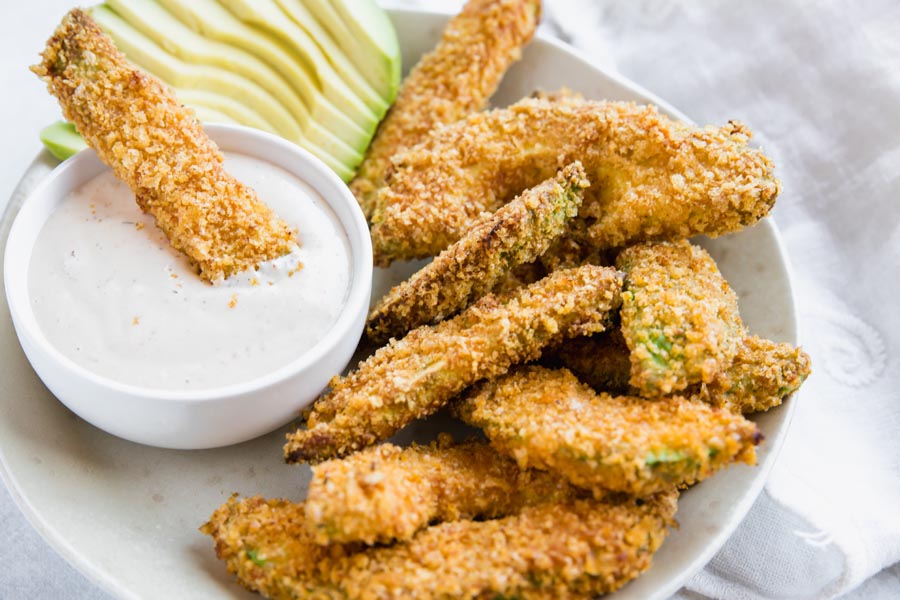 crispy avocado fry sitting in ranch