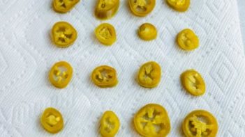 drying jalapenos on a paper towel