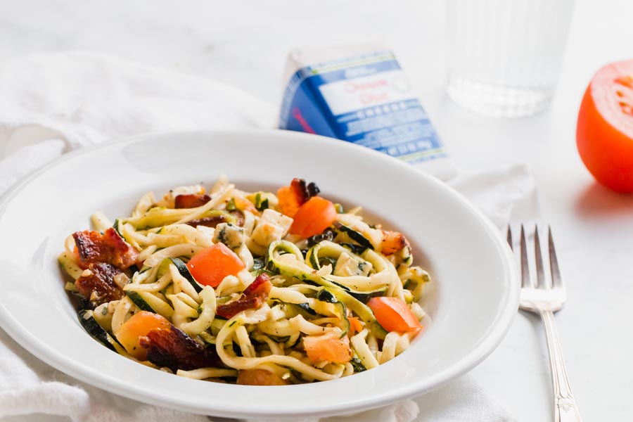 bacon and blue cheese zoodles in a skillet