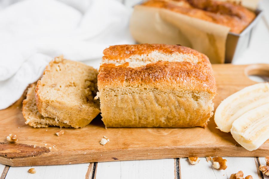 banana free banana bread on a wood cutting board