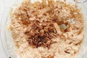 adding walnuts to keto banana nut bread batter