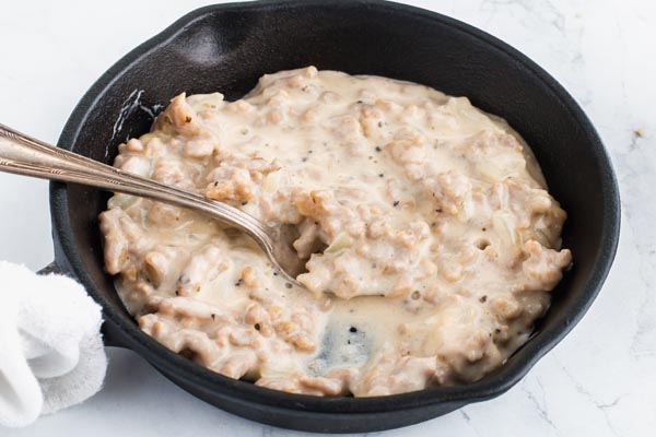 cast iron pan with sausage gravy