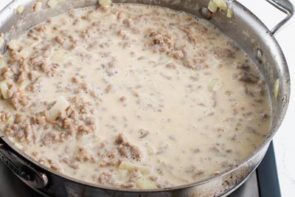 making sausage gravy in a skillet