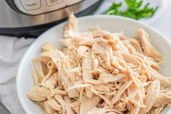 a bowl of shredded chicken