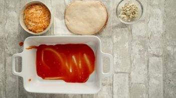 Buffalo sauce on bottom of baking dish