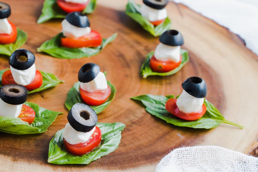 caprese salad bites on a tray