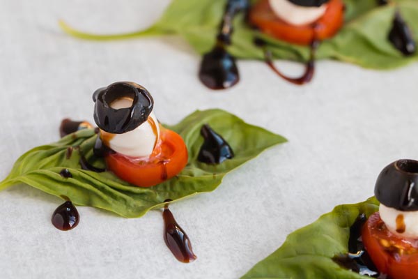 basalmic glaze drizzled on caprese salad