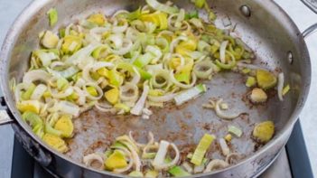 leek cooking in a skillet