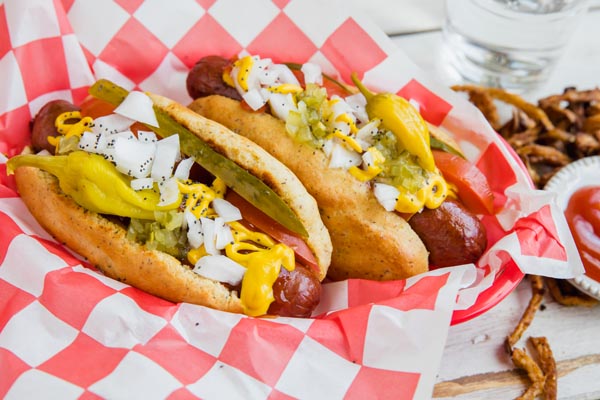 two keto chicago dogs with all the fixings on top