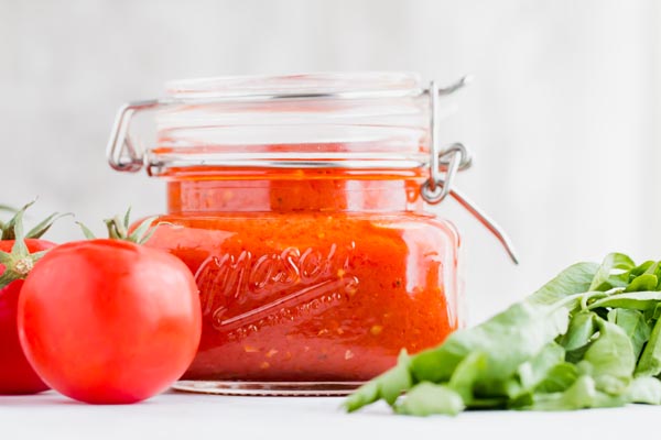 homemade marinara sauce in jar that will be used for keto parm