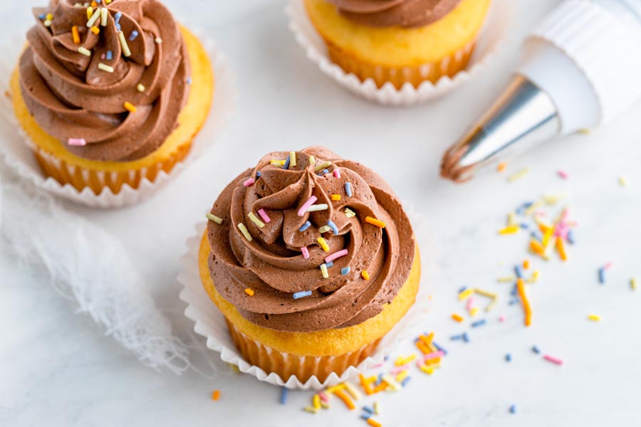 keto chocolate frosting on birthday cupcakes