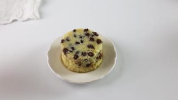 a baked mug cake taken out of the mug and on a plate