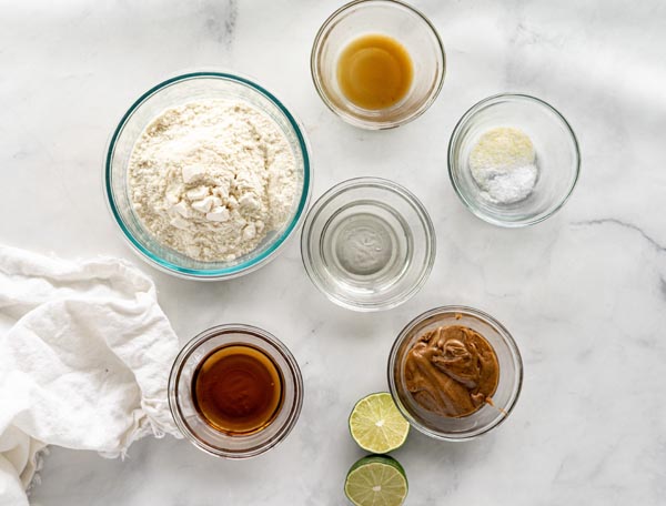 all the ingredients to make coconut lime energy balls on the counter