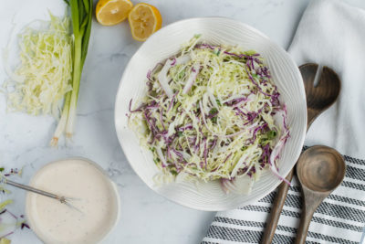 mixing up keto coleslaw