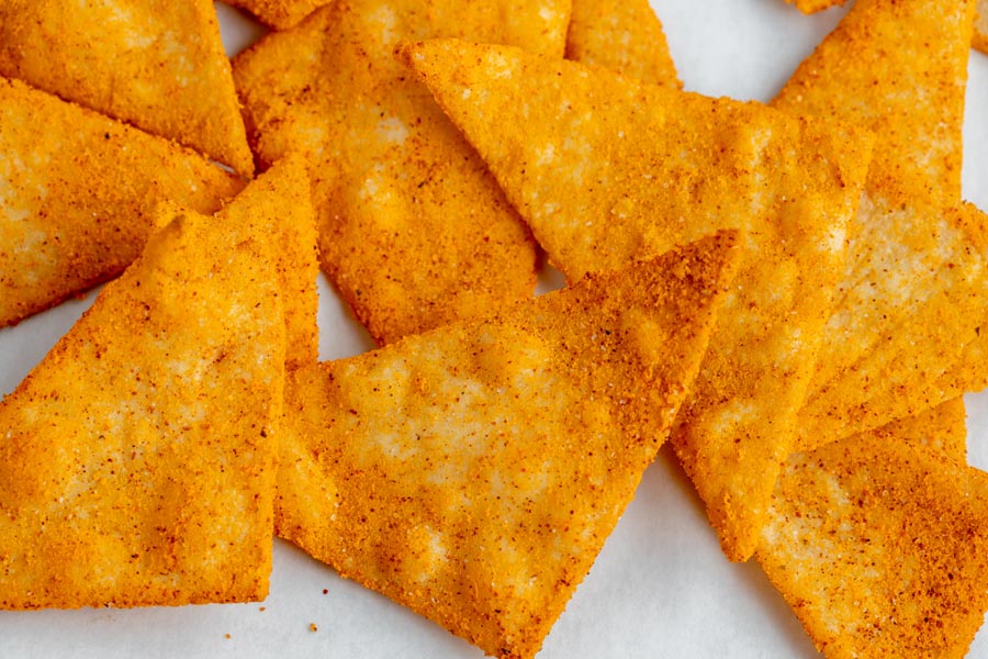 a pile of cheesy nacho doritos