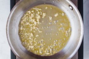 garlic and butter sauting in a skillet