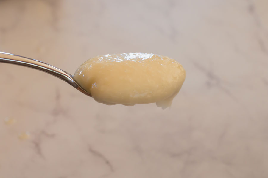 spoonful of keto garlic sauce