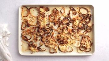 Fried onions on a baking sheet.