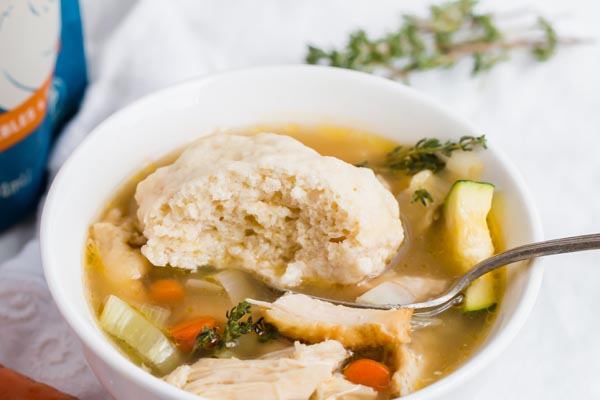 keto chicken and dumplings in a bowl with shredded chicken and vegetables