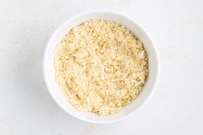 A white bowl with dried ingredients inside.