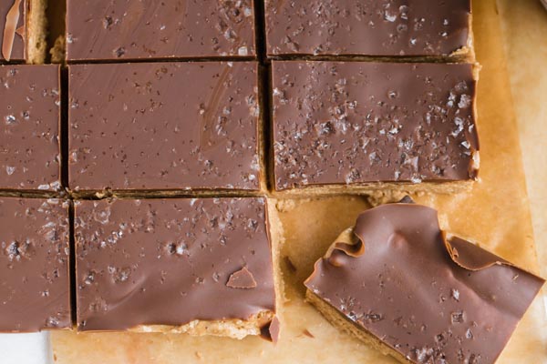 chocolate covered bars cut into rows with one sticking out