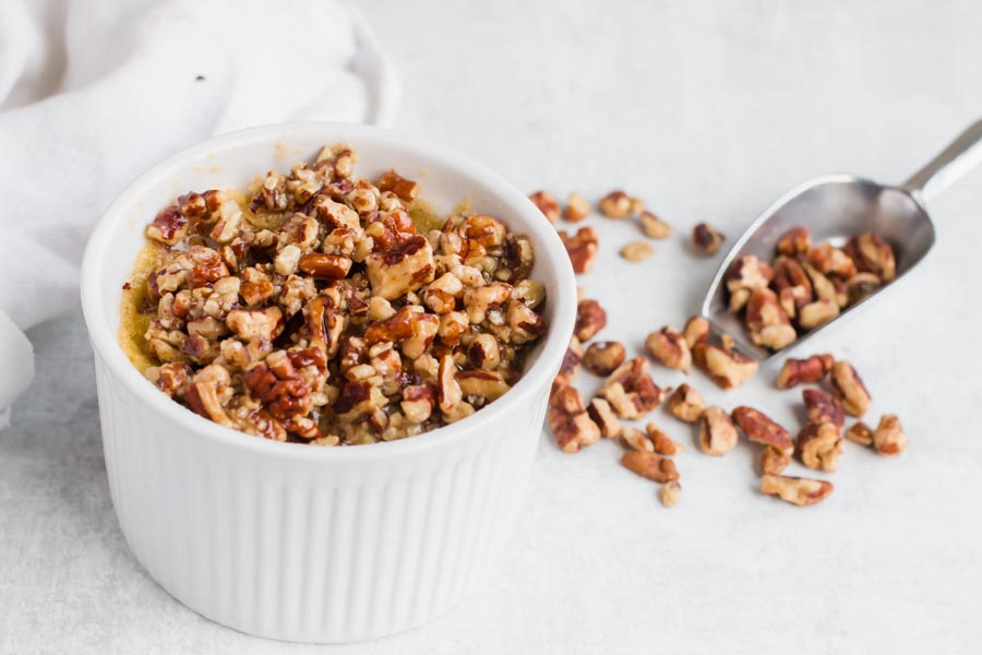 low carb pecan topping on a keto mug cake