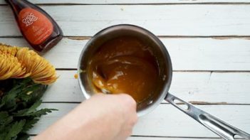 whisking egg yolks into pecan pie filling