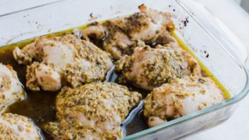 baked pesto chicken in a baking dish