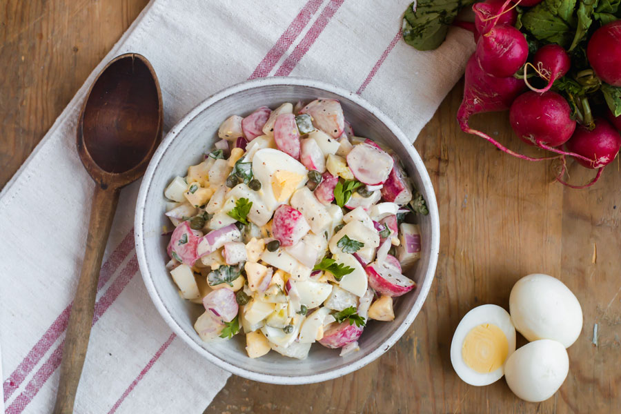 dill pickle in a roasted radish keto potato salad