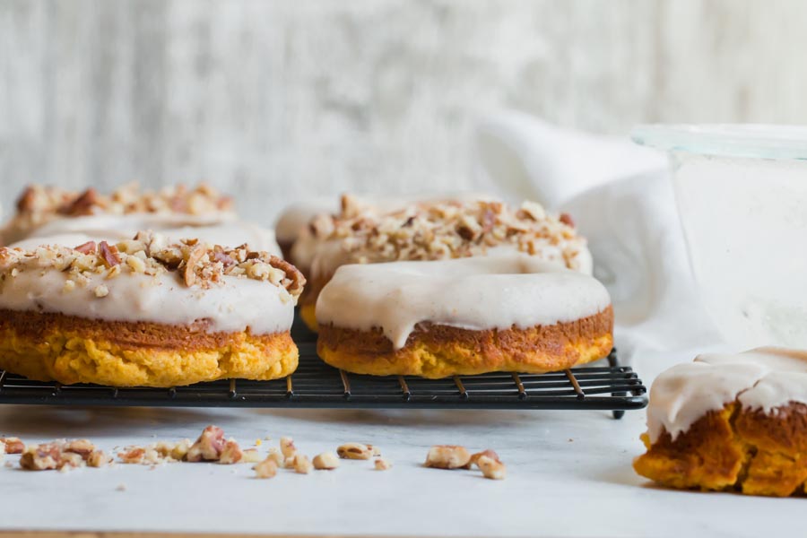 sprinkled pecans on donuts