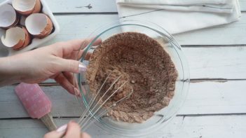 whisking dry ingredients in a bowl