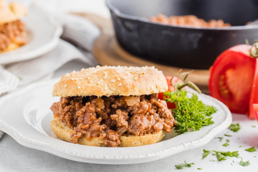 saucy sloppy joe pouring out of a low carb bun