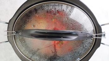 slow cooker covered with steamy lid