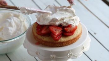 keto cake flipped over on top a wire rack