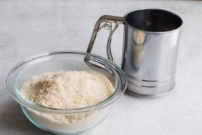 Keto sugar cookie ingredients in a bowl after being sifted