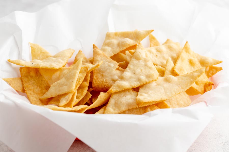 a basket filled with tortilla chips