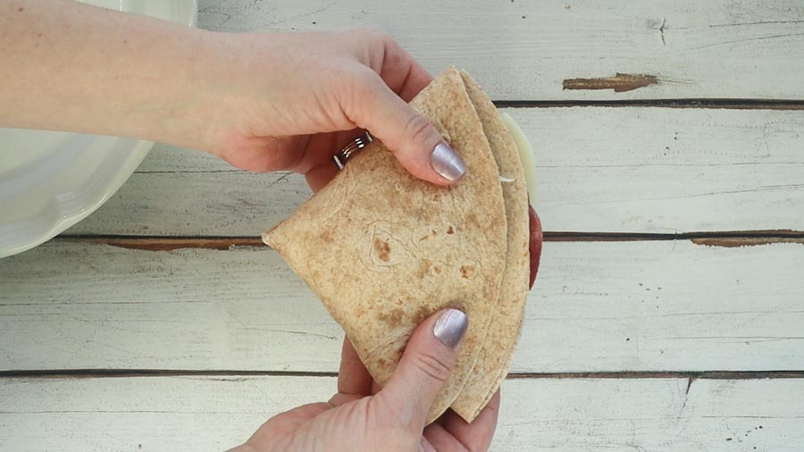 holding a tortilla wrap