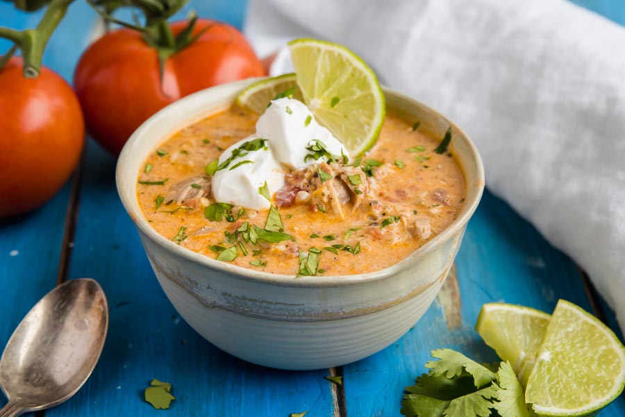 bowl of low carb white chicken chili with tomatoes