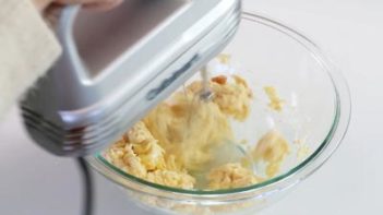 beating butter and sweeteners with an electric mixer