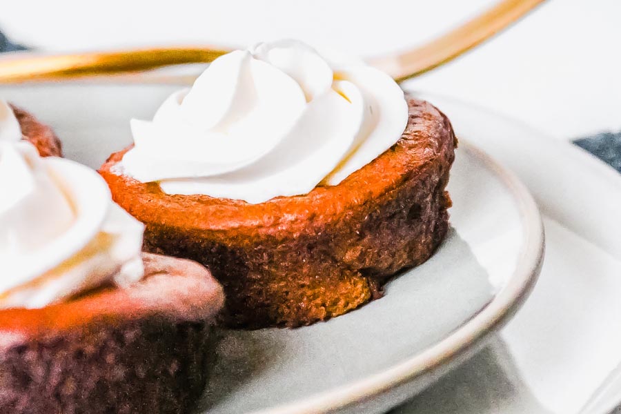 a fancy plate with mini pumpkin pies