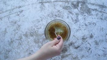 stirring the lime vinaigrette in a small bowl