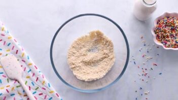 A bowl with dry ingredients inside.