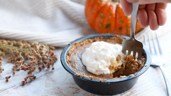 digging into a mini pumpkin pie