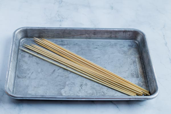 bamboo skewers on pan